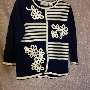 Lightly worn blue and white sweater
